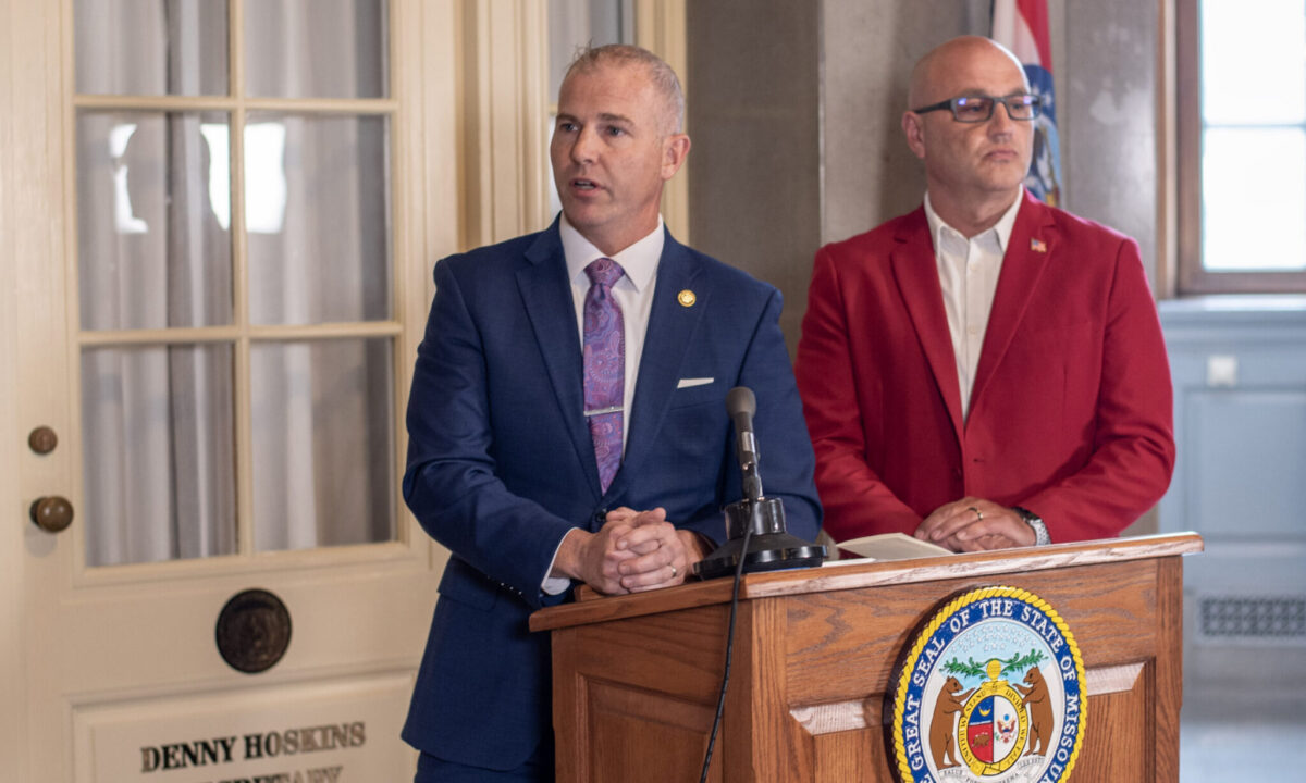 State Sen. Rick Brattin, a Republican from Harrisonville, and Secretary of State Denny Hoskins speak to reporters outside Hoskins's office in the Missouri State Capitol Tuesday. The press conference also drew in LGBTQ+ advocates who criticized the two officials for attacks on a "rainbow story time" held in Columbia Saturday (Annelise Hanshaw/Missouri Independent).